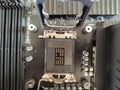 Close-up of CPU socket on motherboard with heatsink bracket and DDR4 memory slots Royalty Free Stock Photo