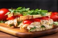 close-up of a crab meat sandwich on a wooden platter Royalty Free Stock Photo