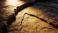 Close-up of cracked golden sandstone with dramatic sunlight Royalty Free Stock Photo