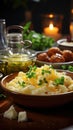 Close-up of creamy buttery boiled potatoes in pieces on a plate