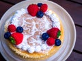 Close up. Creamy mascarpone cheese cake with strawberry and winter berries. Japanese Cheesecake. Close up. Christmas dessert. Royalty Free Stock Photo