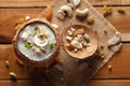 Close-up of Creamy Sabudana Kheer Garnished with dry fruits. Indian delicious dessert. Served in the coconut shell. Top View Royalty Free Stock Photo