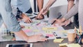 Close up creative designer applaud for job success at meeting table at office