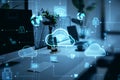 Close up of creative designer workplace with computer monitor and digital cloud computing hologram on blurry background. Cloud