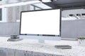 Close up of creative marble designer desktop with empty white mock up computer monitor and supplies in modern coworking office Royalty Free Stock Photo