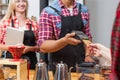 Close up credit card payment coffee shop bar counter barista serving client Royalty Free Stock Photo