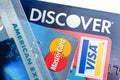 Close up of credit cards with Discover,American Express,visa and MasterCard logos on white background,illustrative editorial Royalty Free Stock Photo