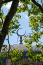Crescent, dome and minaret of the London Central Mosque, part of the Islamic Cultural Centre, Regent`s Park, London UK Royalty Free Stock Photo