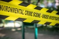 Yellow police line tape.Crime scene with blurred light background. Royalty Free Stock Photo