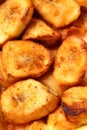 A close-up of crispy banana fritters, coated in golden batter and cut into bite-sized pieces. Royalty Free Stock Photo