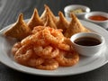 Close Up of Crispy Fried Shrimp and Appetizers with Dark Dipping Sauce Royalty Free Stock Photo