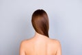 Close up cropped back view photo of young brown haired girl stan Royalty Free Stock Photo