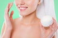 Close up cropped half face portrait of woman holding jar with face cream applying for dry skin isolated on white Royalty Free Stock Photo