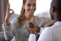 Hearing impaired disabled happy family couple showing gestures. Royalty Free Stock Photo