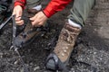 Close up cropped photo of alpinist man pull sling on anti-slip h Royalty Free Stock Photo