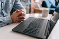 Close-up cropped shot wrinkly hands of unrecognizable nervous mature business man sitting in closed posture, tension or Royalty Free Stock Photo