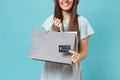 Close up cropped smiling pretty caucasian woman in summer dress holding packages bags with purchases after shopping Royalty Free Stock Photo