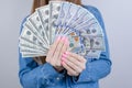 Close-up cropped view photo of pretty wearing casual outfit she her lady holding big pile of money in hands  grey Royalty Free Stock Photo