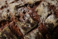 Close-up of cross hatch marks on loaf of artisanal bread