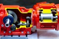 Close-up of cross-section helical gearbox with motor