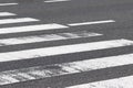 Close-up crosswalk on asphalt road Royalty Free Stock Photo