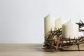 Close up of crown of thorns of Jesus on top of the holy bible on wooden table Royalty Free Stock Photo