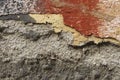 Close up of crumbling wall with layers of peeled paint 9