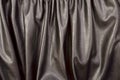 Close up on crumpled black leather material textured fabric. Royalty Free Stock Photo