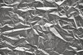 Close-up of crumpled silver aluminum foil texture. Abstract background for design. Royalty Free Stock Photo