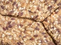 Close up of Crunchy crispy seed homemade bread. Healthy snack. multigrain cereal flax, sesame and sunflower seeds. Close up flat