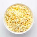 Close-Up of Crunchy Lemon Bhel in a white ceramic bowl made with Puffed Rice small besan sev. Indian spicy snacks Namkeen
