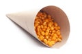 Close up of crunchy masala boondi Indian namkeen snacks In handmade handcraft brown paper cone bag