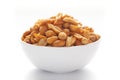 Close up of Crunchy masala peanuts Indian namkeen snacks on a ceramic white bowl