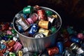 close-up of crushed aluminum cans in a recycling bin