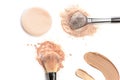 Close-up of crushed mineral shimmer powder golden color with makeup brush Royalty Free Stock Photo