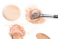 Close-up of crushed mineral shimmer powder golden color with makeup brush Royalty Free Stock Photo