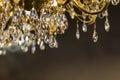 Close up on the crystal of chandelier. Dark background with empty space Royalty Free Stock Photo
