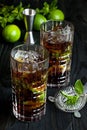 Cuba libre cocktail, iced drink with lime,  cola, rum  and mint Royalty Free Stock Photo