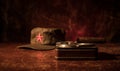 Close up of a Cuban cigar and ashtray on the wooden table. Communist dictator commander table in dark room. Army general`s work