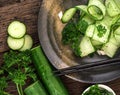 Close up cucumber salad and with chia seeds and the green parsley leaf in black plate , heathy salad for anti aging with rich