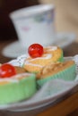 A close up of a cup cake with a cherry on top Royalty Free Stock Photo