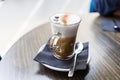 Close up of cup of capuchino coffee with foam at restaurant Royalty Free Stock Photo
