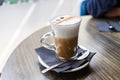 Close up of cup of capuchino coffee with foam at restaurant Royalty Free Stock Photo
