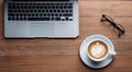 close-up of cup of coffee and laptop keyboard, business mans table, keyboard on the table, close-up of laptop keyboard