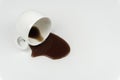 Close up of a cup of coffee spilled