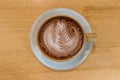 Close up a cup of hot latte art coffee. Royalty Free Stock Photo