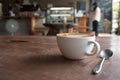 Close up of Cup of hot latte art coffee on wooden table Royalty Free Stock Photo