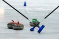 Close up of a Curling game situation. Royalty Free Stock Photo