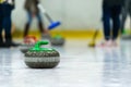 Close up of a Curling game situation. Royalty Free Stock Photo