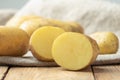 Close-up cut of a fresh ripe potato tuber. Royalty Free Stock Photo